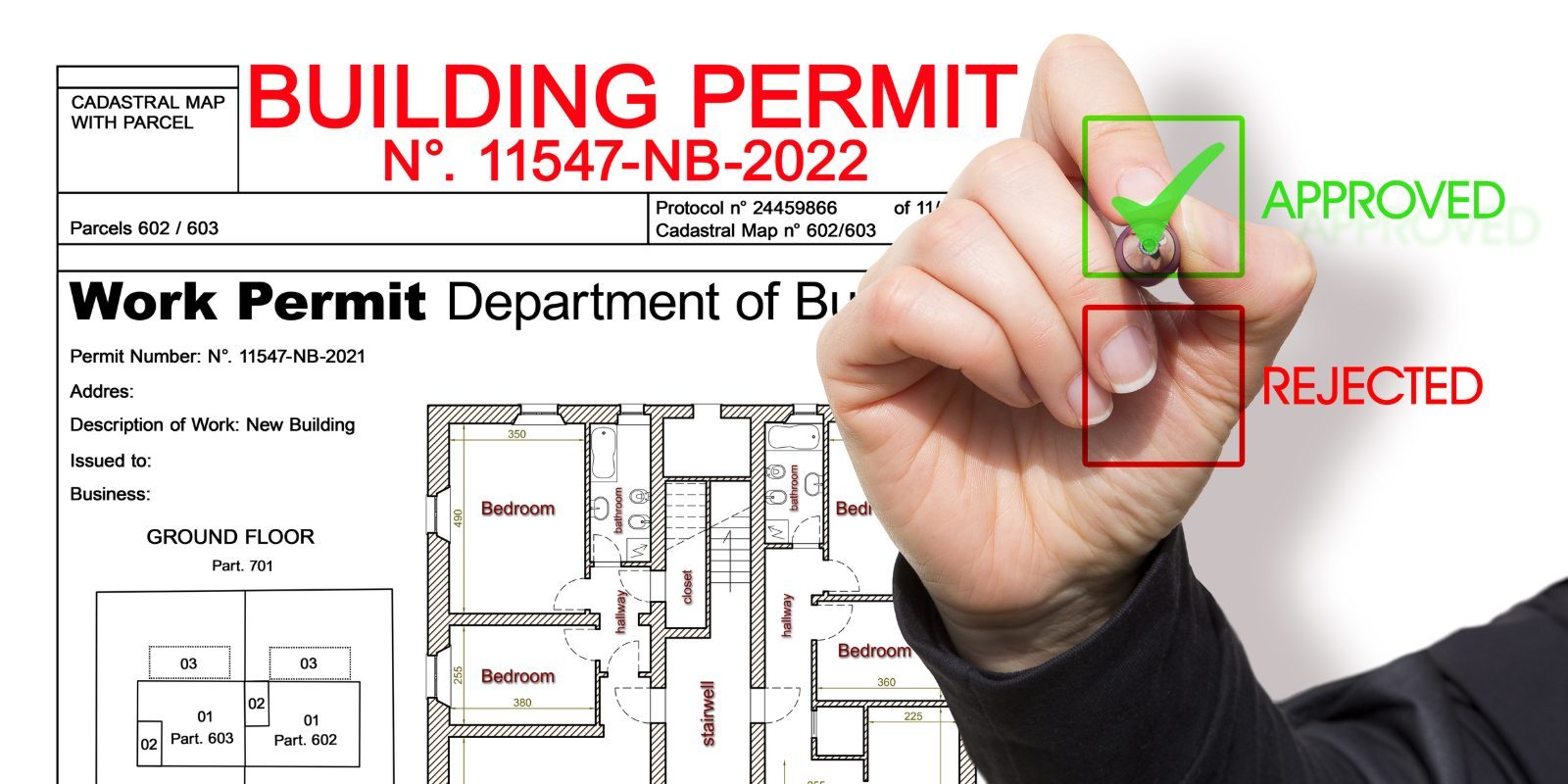 A hand marking an approval checkbox on a building permit application beside a floor plan.